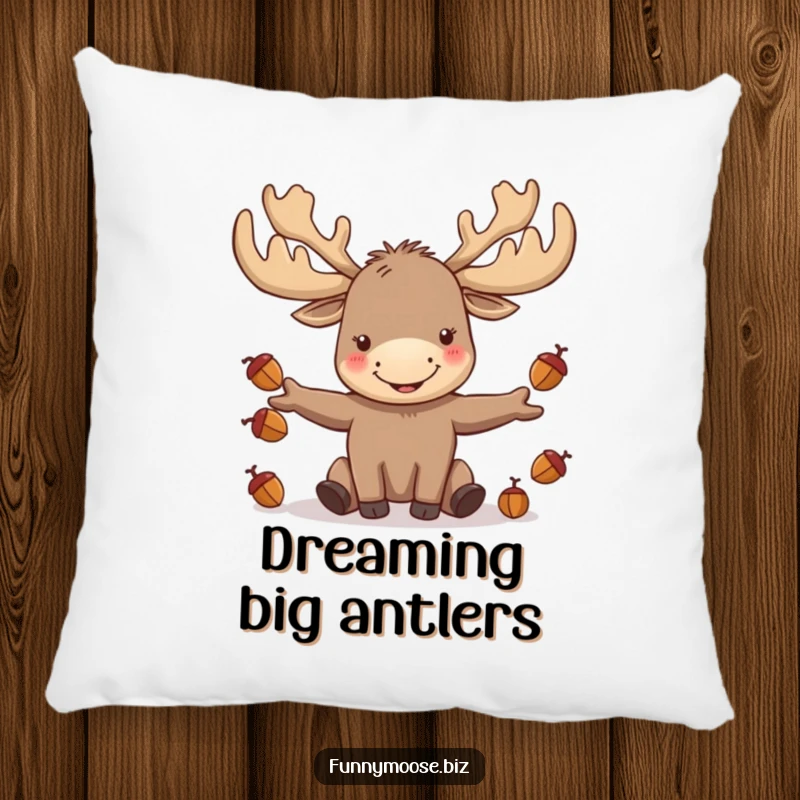 Funny kawaii moose with large antlers juggling acorns, featured on a soft and plush pillow for whimsical comfort.